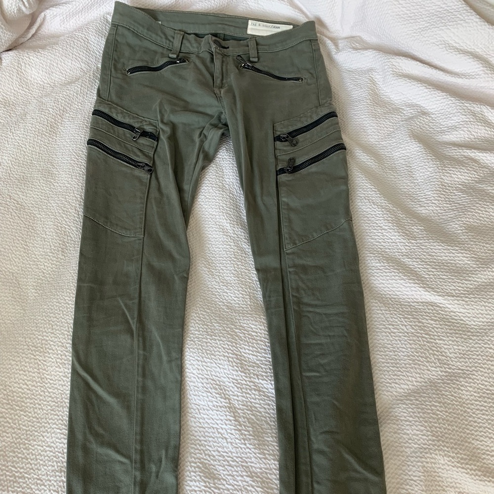 Army green jeans with zippers